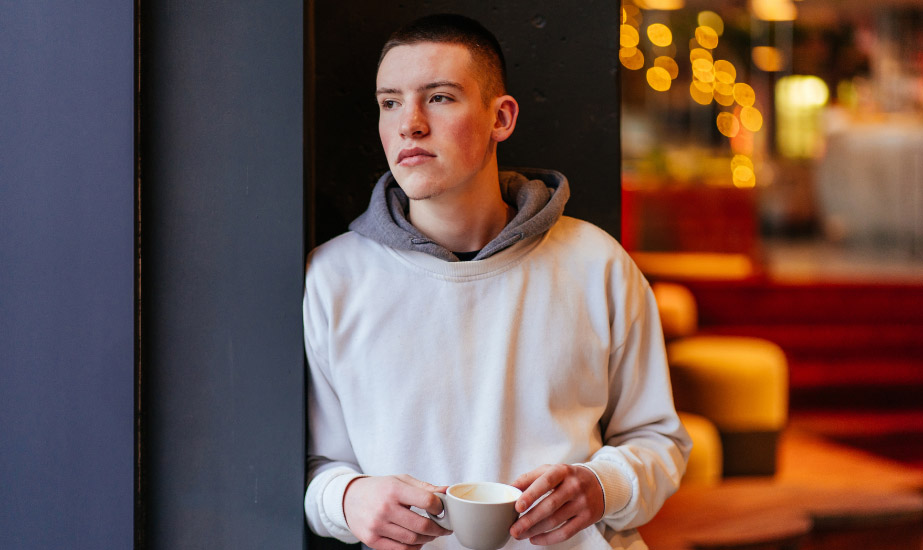 Young man in coffee shop